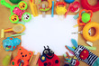 © dyageleva - Children's toys and accessorieson a wooden background