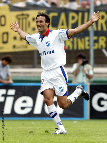 Luis Romero, striker of Uruguayan soccer club Nacional celebrates after scoring.