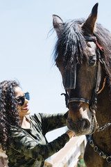 Wall Mural - Latin girl with the horse