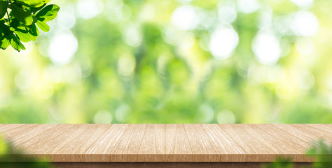 empty wood plank table top with blur park green nature background bokeh light,mock up for display or