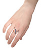 © Николай Григорьев - Female hand with a ring on a white background