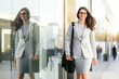 © elnariz - Businesswoman in stylish suit on her way to office workplace in financial business setting