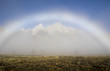 Fogbow forms over the Tetons on a foggy evening