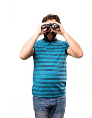 Wall Mural - young cool man with binoculars