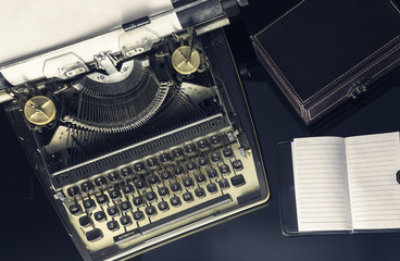 Retro typewriter with conceptual image for creative block