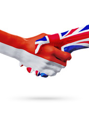 Wall Mural - Flags Monaco, United Kingdom countries, partnership friendship handshake concept.