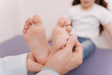 Neat Skillful Rheumatologist Massaging Patients Toes