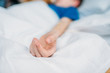© LIGHTFIELD STUDIOS - partial view of little boy lying in hospital bed