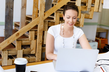 Young woman in office