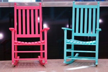 Colorful wooden rocking chairs 