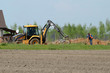 Excavator performing ground works
