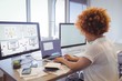 © wavebreak3 - Focused businesswoman working on laptop