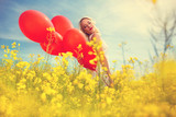 Fototapeta Tulipany - beautiful sensual girl with balloons