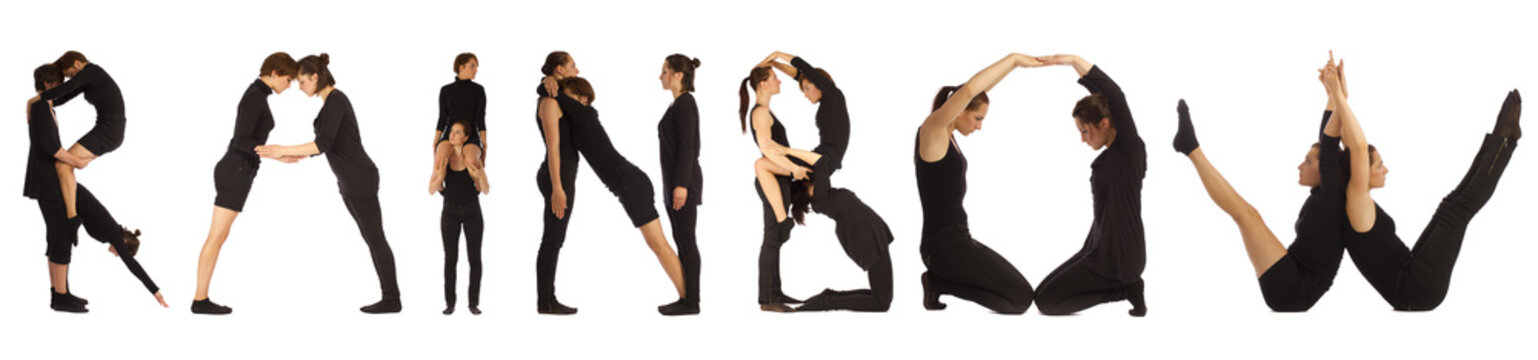 Black dressed people forming word RAINBOW