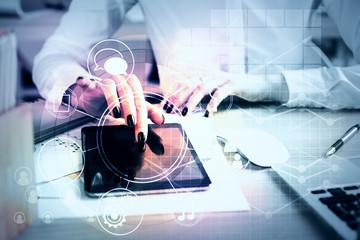 Poster - Woman using tablet with business diagram