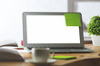 © peshkova - Blank white laptop with green sticker