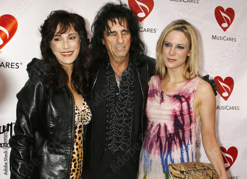 Rock Star Cooper Poses With Wife Sheryl And Daughter Calico As They Arrive At The MusiCares Rock Star Cooper Poses With Wife Sheryl And Daughter Calico As They Arrive At The MusiCares