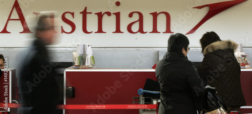 Passengers Wait At A Check In Counter Of Austrian Airline Aua At