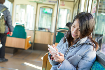 Sticker - Young woman use of mobile phone