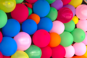 many multicolored balloons wall full of colors