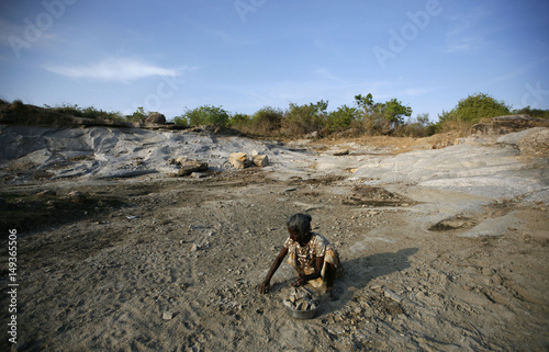 A Woman Collects Small Pieces Of Granite In Quarry The Remote A Woman Collects Small Pieces Of Granite In Quarry The Remote Village Thumbalai