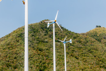 Wind turbines on chang hua man project in thailand.