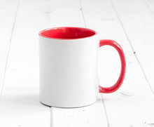 Simple White Cup With Red Inside And Handle On A Planked Table