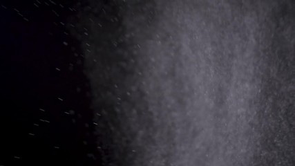 Wall Mural - white powder exploding isolated on black