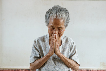 Wall Mural - Pray of senior asian woman