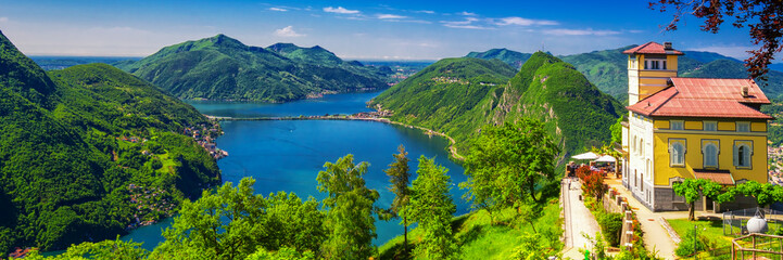 Wall Mural - Panorama Restaurant with stunning view to Lugano city and Lugano lake, Ticino, Switzerland