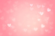 Heart bokeh on pink background