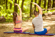 © V&P Photo Studio - Fitness couple stretching outdoors in park