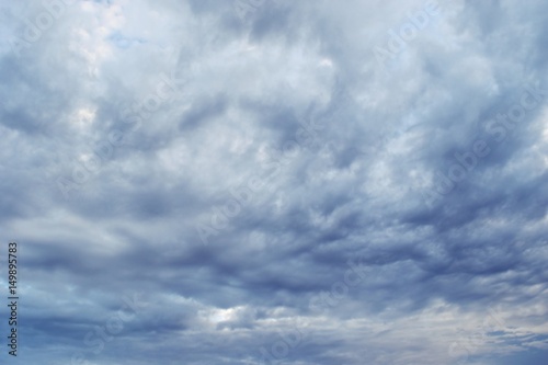 Fotografie, Obraz Gray cloud formations on sky,Nimbus moving,Appearance of raincloud,Strange shape