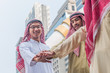 © lersan - The group of arabian businessman smiling and shake hand for cooperation with partner