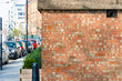 Red brick wall and London street