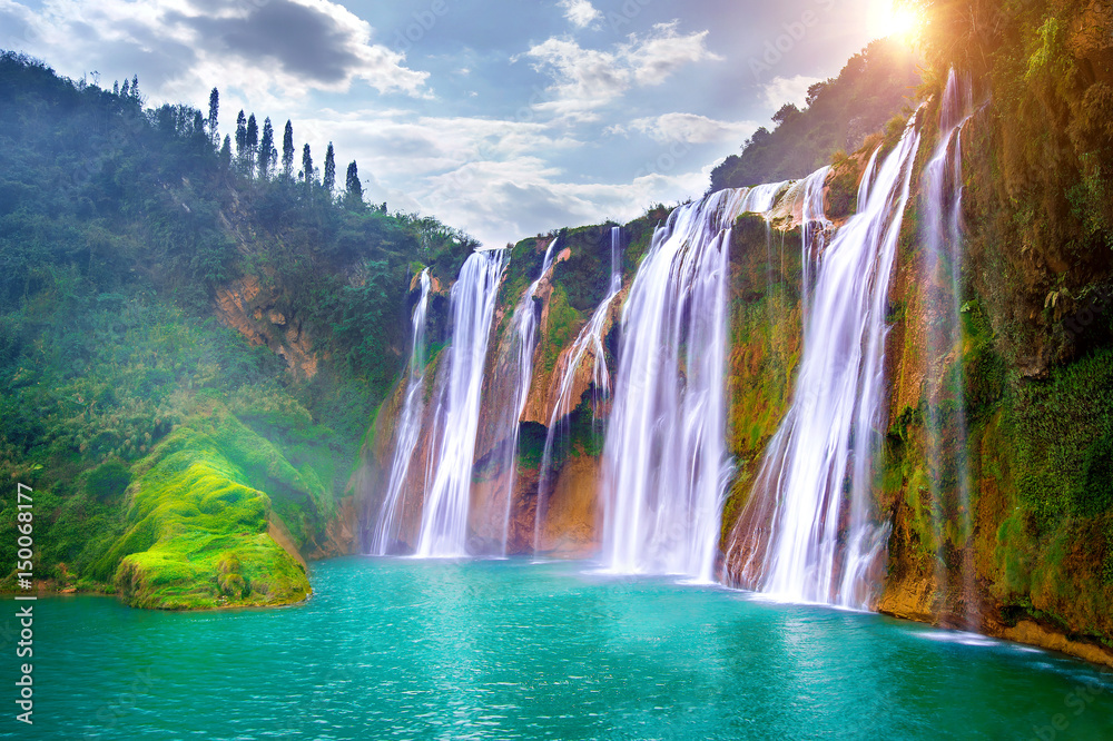 Jiulong waterfall in Luoping, China. - obrazy, fototapety, plakaty 