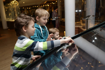 Brothers using touch screen