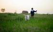 © chernikovatv - Small boy and cute dog on a field