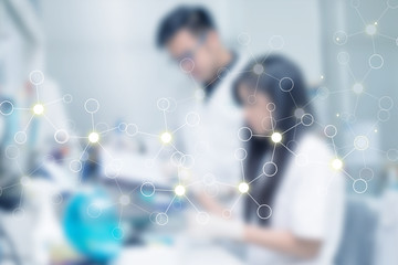 blurred background Laboratory scientist working at lab with test tubes with science abstract graphic foreground.