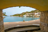 Fototapeta Morze - Beautiful Sardinian port Poltu Quatu and mountains. Poltu Quatu, Sardinia, Italy