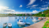 Fototapeta  - Wonderful romantic summer evening landscape panorama coastline Adriatic sea. Boats and yachts in harbor at cristal clear azure water. Old town of Krk on the island of Krk. Croatia. Europe.