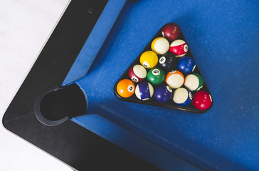 Playing billiard. Billiards balls an cue on billiards table. Billiard sport concept. Pool billiard game.