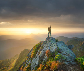 Wall Mural - mountain climber on the high rock. sport and active life concept
