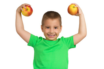 Portrait of a happy child with apples in hands