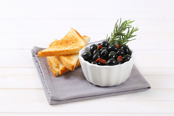 Poster - black olives with dried tomatoes and toasts