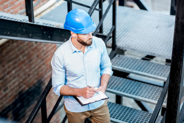 Foreman on the structure stairs