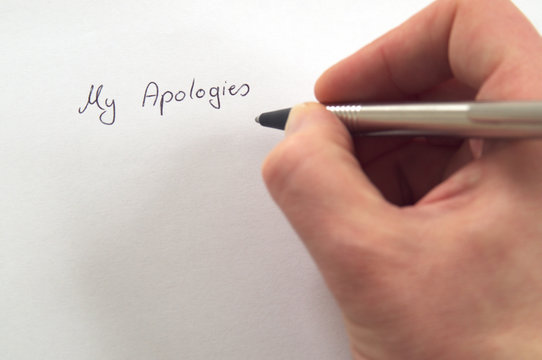 My Apologies in handwriting by hand with pen on white paper