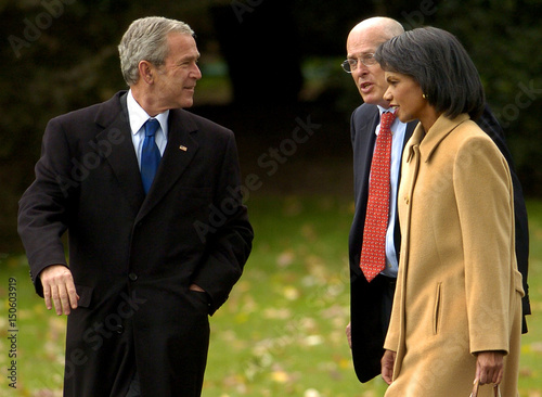 U S President George W Bush Walks With Cabinet Members Rice And