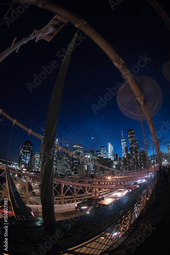 Fotografie, Obraz A wide angle shot of New York City's Brooklyn Bridge at sunset