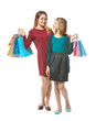 © Africa Studio - Mother and daughter with paper bags on white background